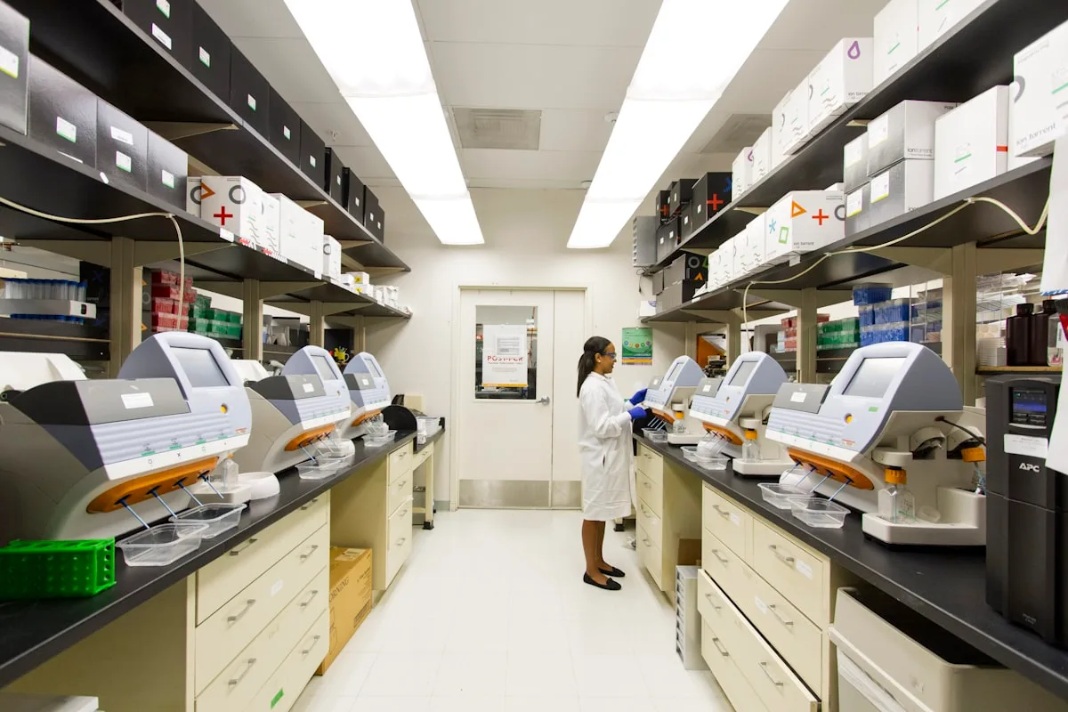 Diagnostic technician examining metabolic panel blood samples